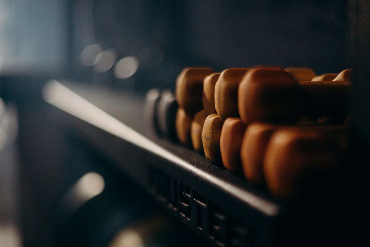 Brown Wooden Chess Piece on Black Computer Keyboard